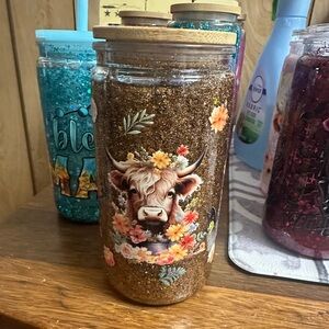 Snow globe highland cow